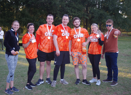 Gold medalists from the JMCOlympics showing off their medals.