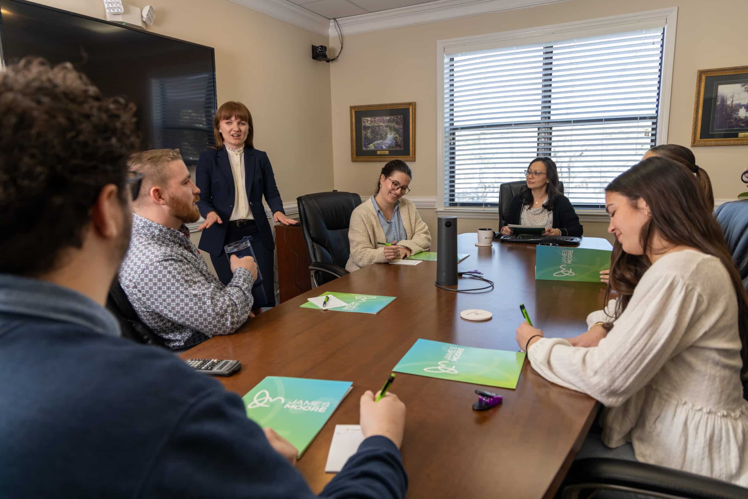 TLH_2025_Stock Photos-6070 A diverse group of James Moore accountants in the Tallahassee office training staff.